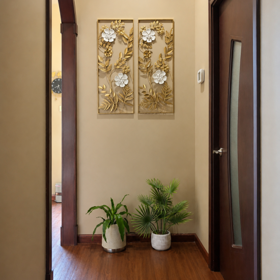 Decorative Wall Art and Potted Plants in Spa Hallway