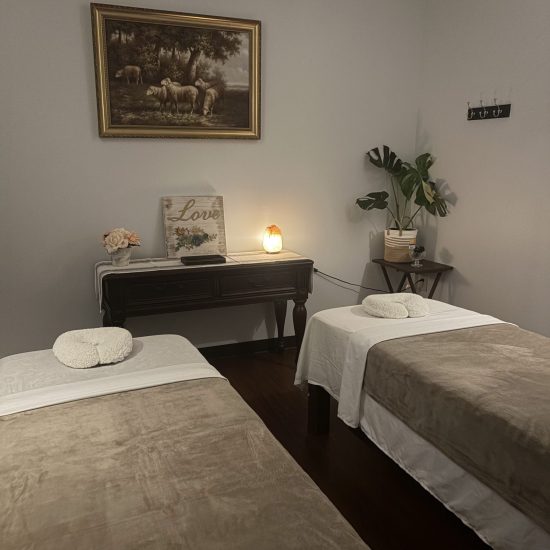 Cozy Spa Room With Two Massage Tables and Calming Decor