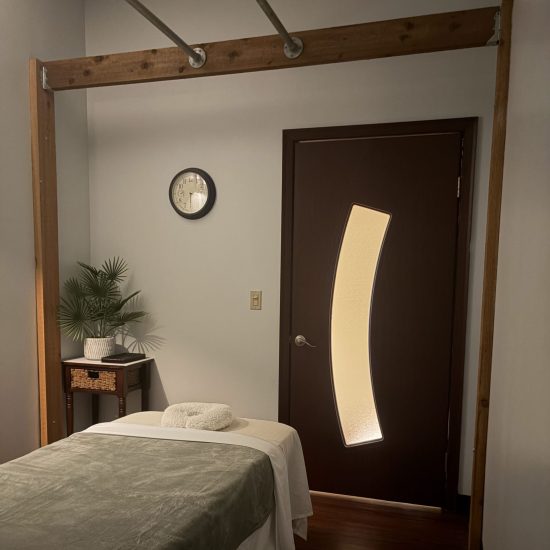 Cozy Spa Room with Massage Table and Soft Lighting